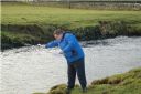Rev John Nugent blessing the River Wick